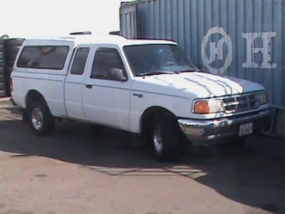 low miles
camper sell
all power
cd
v6