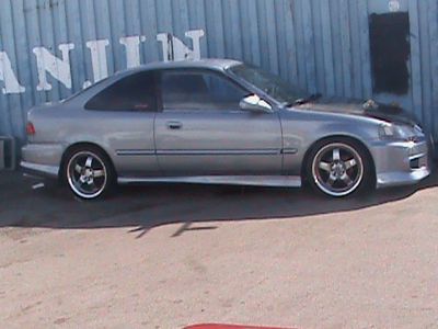 5 spd
fiber hood
body kit
headers
3000 obo
