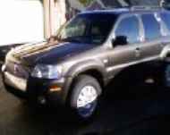 Beautiful 2005 Brown Mercury MARINER-V6 Utility 4D Luxury (4WD). 

*75,000 miles 
*Very good condition 
*Two-tone brown and beige cloth seats 
*Roof rack 
*Six-disk CD player 
*One non-smoking owner 
*No pets or children in household (back seat rarely used) 
*Dual Air Bags 
*Alarm System 
*Fold down second row 
*Cruise control 
*Keyless entry 

Only selling because receiving company car... Thank you for your interest! 
