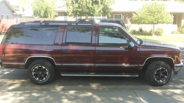 1998 GMC Suburban runs great - (new rims, tires, exhaust) Must sale hate to get ride of it but just stated my business and need to get dump truck. Please call me at 209 605-8329