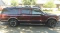 1998 GMC Suburban runs great - (new rims, tires, exhaust) Must sale hate to get ride of it but just stated my business and need to get dump truck. Please call me at 209 605-8329